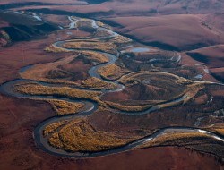 Rivers snake through the embrace of mountains in the Peel Watershed © Peter Mather - 